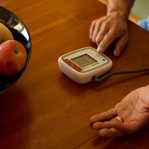 Man Checking Blood Pressure