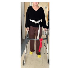 stroke survivor improves balance-walking at rehab center